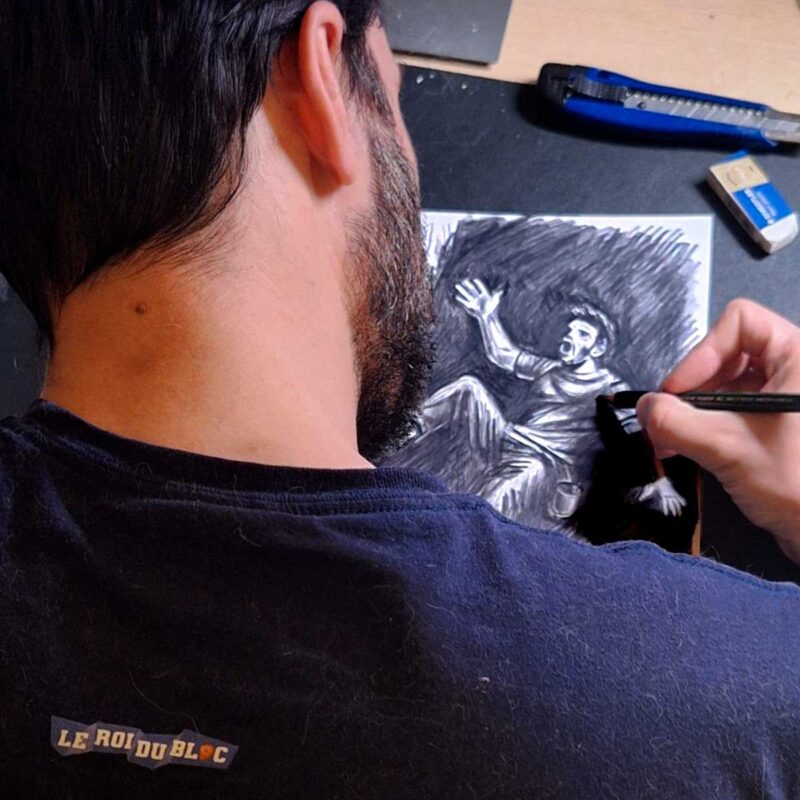 Homme dessinant un grimpeur