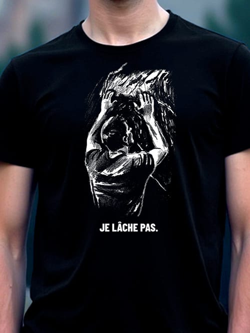 Grimpeur homme portant le t-shirt escalade Je lâche pas