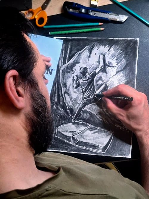 Homme en train de dessiner